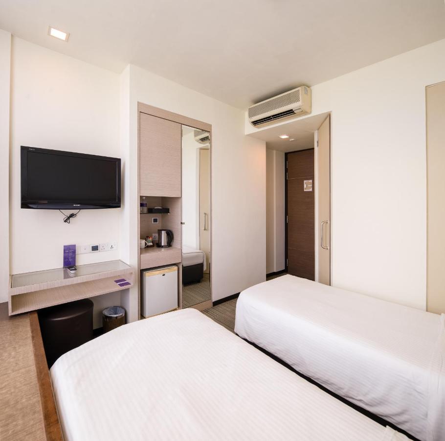 Aqueen Hotel Lavender Singapura Quarto foto